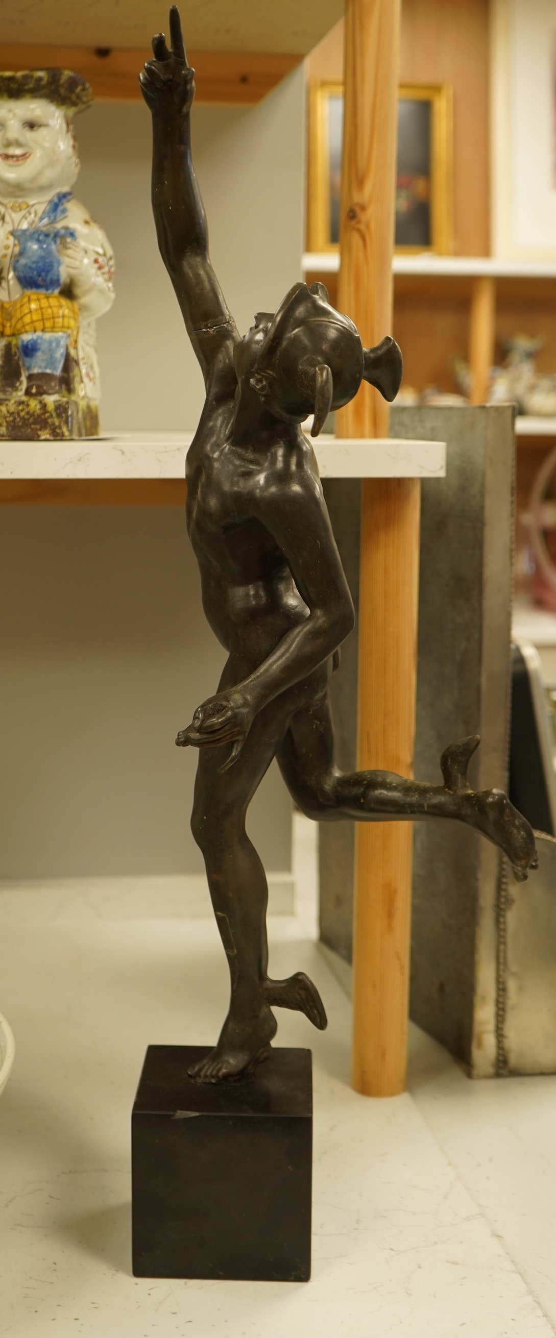 After the antique, a bronze study of Mercury raised on square base, 70cm high